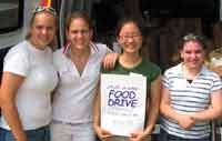 Volunteers posing with the van